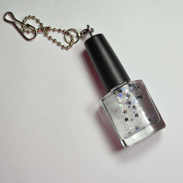 mini nail polish bottle with decorative glitter