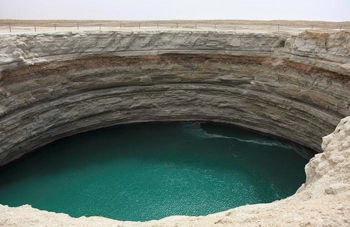 Universe Beauty Turquoise lake crater  Darvaza Turkmenistan