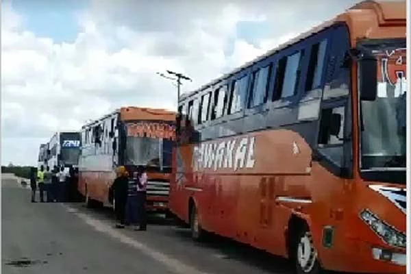 Tawakal buses heading to Lamu from Mombasa at Gamba police barrier.  PHOTO | NMG