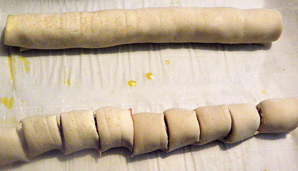 Two Long Sausage Rolls, One cut into Pieces