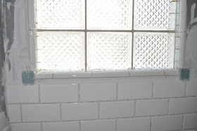 bathroom, reno, subway tile, sea glass tile, glass tile, white grout, grout, glass block window, 