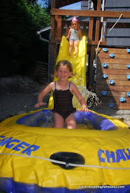 Water-Slide-Obstacle-into-Boat from Meaningful Mama.