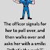The officer signals for her to pull over