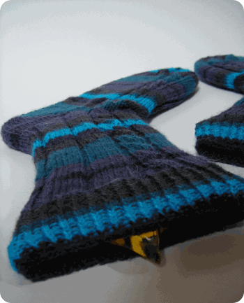 Socken 12-2012 Xena Einseitenzopf