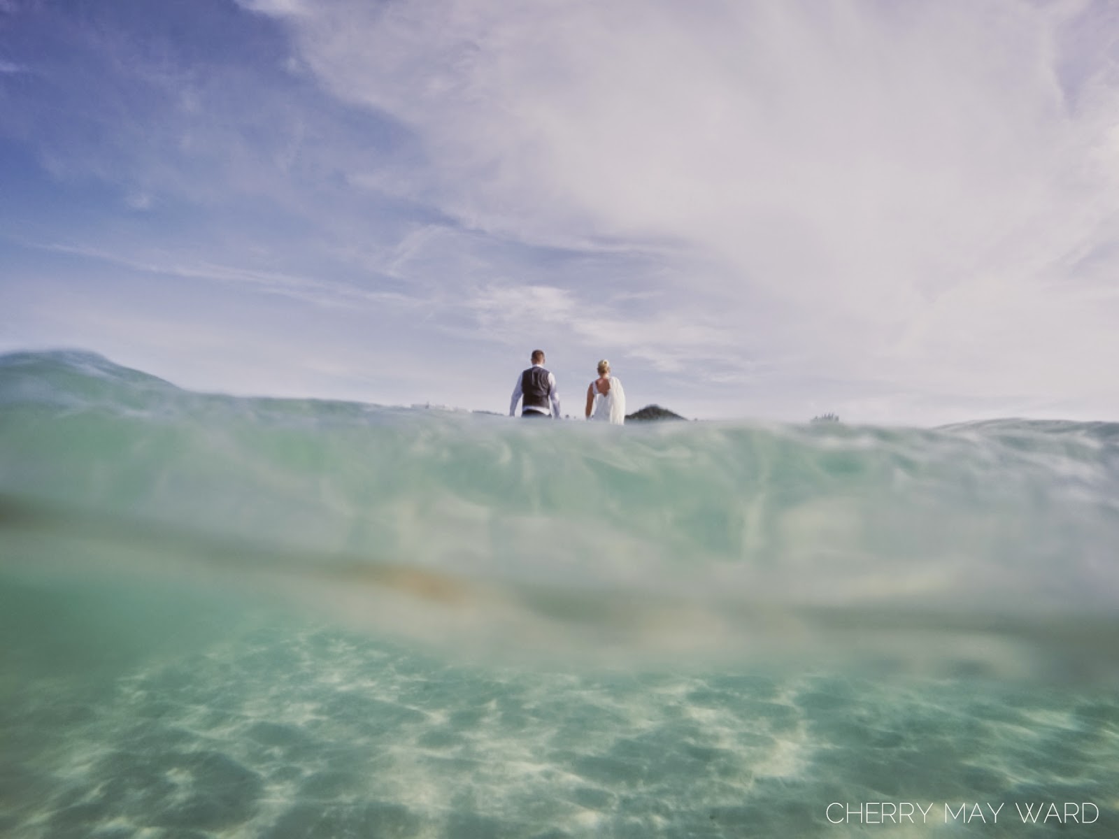 bride and groom walking away after finishing trash the dress session on Koh Samui, Chaweng beach, Thailand, professional underwater photos on Koh Samui