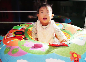 Happy Baby in the Galt Playnest