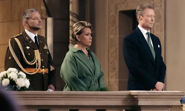 Grand Duchess Maria Teresa wore a green belted wool coat from Belgian fashion house Natan