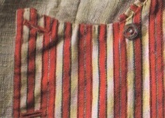 Part of a waistcoat made of striped half-wool