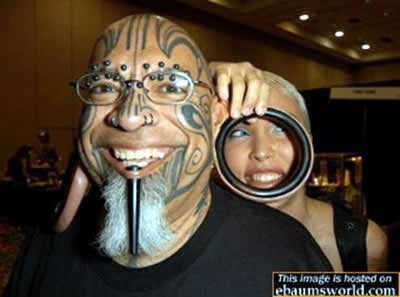 Strange Tattoos and Ugly body modifications Seen On coolpicturesgallery.blogspot.com