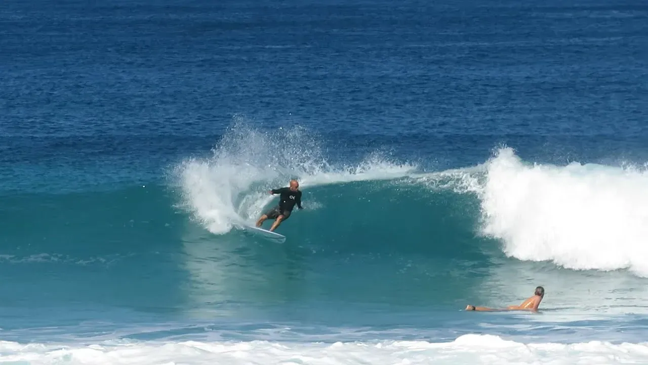 Kelly Slater surfs a sandbar in Hawaii