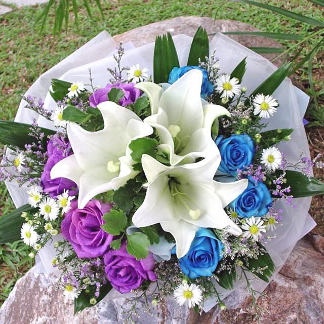 Four wedding floral bouquets using shades of purple as the main source of