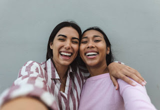 Selfie of two female friends