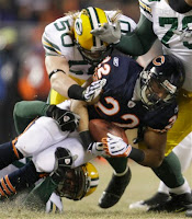 Monday Night Football - December 22, 2008 - Green Bay Packers at Chicago Bears - Bears RB Matt Forte Runs Into Green Bay Defenders Aaron Kampman and A.J. Hawk