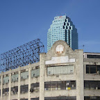 Cleaning Time - That's the faded motto on the foreground building. From Queens Blvd. over the LIRR in Queens.