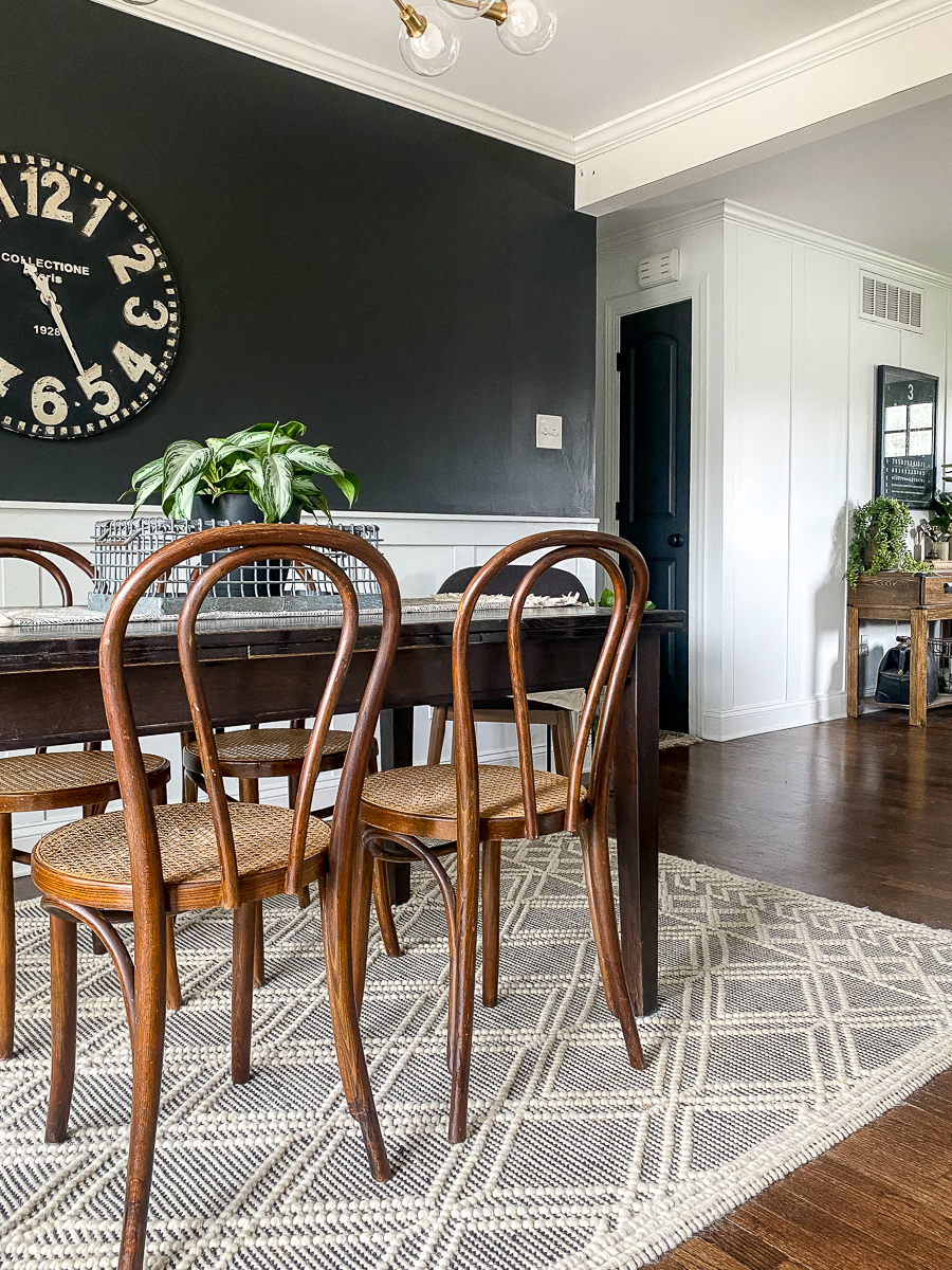 High contrast dining room with bentwood chairs