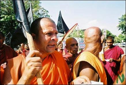 Buddhist monks with weapons