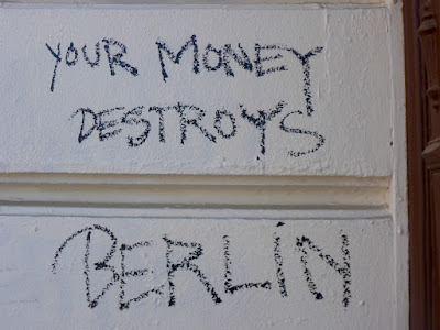 YOUR MONEY DESTROYS BERLIN