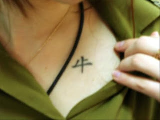 Girl Breast with Chinese Character Tattoo 