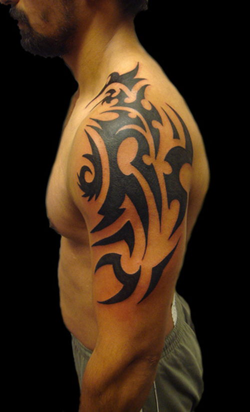maori shoulder tattoo. tattoo. maori shoulder