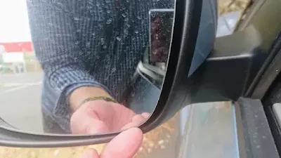 carefully remove car mirror glass