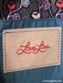 Hand stitched label on interior pocket