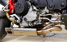 2004 Ducati 999S Cafe Racer Ducati Cafe Racer based on a 2004 Ducati 999S. This Ducati 999S Cafe Racer is named Red Devil 999 by Claudio Zanotto.  Ducati 999S Cafe Racer features Ducati cafe racer seat Custom Cafe racer clip-on handle bars Ducati Exhaust by Virex. 2004 Ducati 999S Cafe Racer "Red devil 999" was a One of the attractive contestants at the Sun Ride icon award.