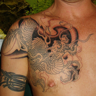 Right Breast Asian Dragon Tattoo