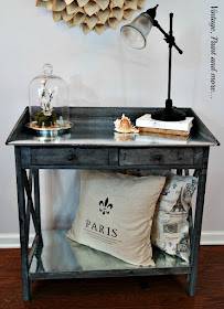 Rustic potting bench with galvanized sheeting top and shelf