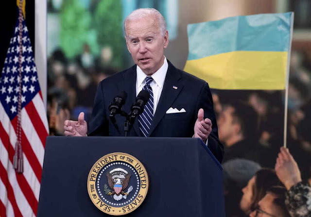 epa10028430 US President Joe Biden announces a federal gas tax holiday in an attempt to lower gas prices, in front of the image of the national flag of Ukraine, in the Eisenhower Executive Office Building on the White House complex in Washington, DC, USA, 22 June 2022. Biden blamed Putin and the ongoing Russian invasion of Ukraine for a spike in gas prices and announced plans to attempt to lower prices. EPA/MICHAEL REYNOLDS