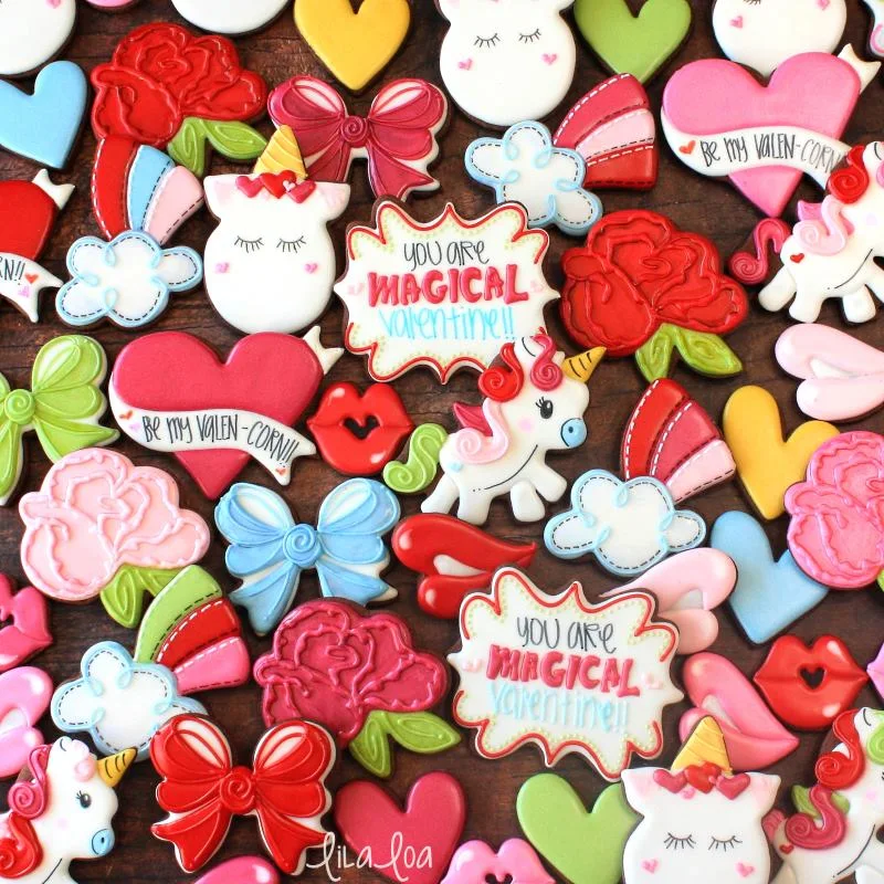 Brightly colored Valentine sugar cookies - unicorns, rainbows, roses, hearts, and bows