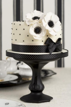 Simple one tier anemone black and white cake perfect for a small wedding or 