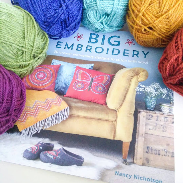 Big Embroidery by Nancy Nicholson surrounded by Stylecraft Special DK