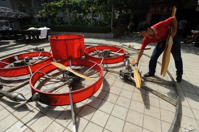 Former Chinese Farmer Builds Homemade Flying Saucer