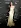 Phoebe Dynevor Dazzles in Gold Satin Gown at ELLE's Women In Hollywood Event