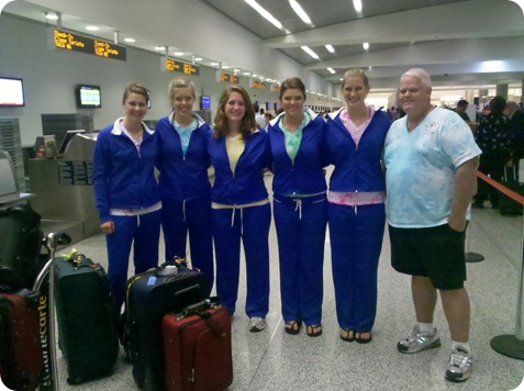 team picture at the Miami airport