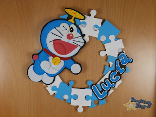 cartel puerta doraemon