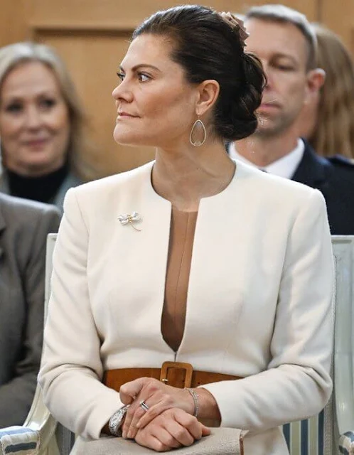 Crown Princess Victoria wore a kiana caramel beige blouse by Andiata. Andiata Sea caramel beige skirt. Charlotte Bonde earrings