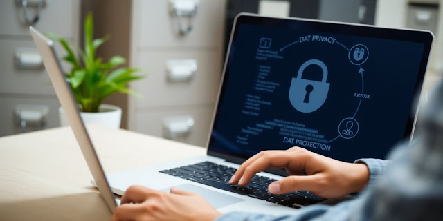 A person using a laptop in a secure space.