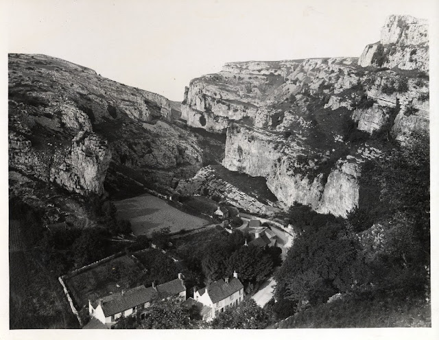 Cheddar Gorge. Lying on the southern edge of the Mendip Hills the gorge in Carboniferous Limestone was formed by mettwater floods in periglacial periods