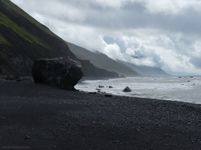 068: coastline with rising clouds