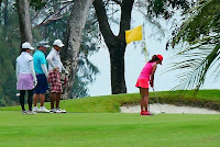 golfers playing on a coastal golf course | Gulf Shores AL