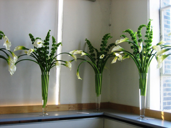 Calla Lilies and Bells of Ireland for Tall Centerpieces photo by my florist