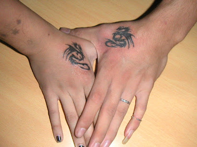 Lovers' Cute Tribal Dragon Tattoo on hand