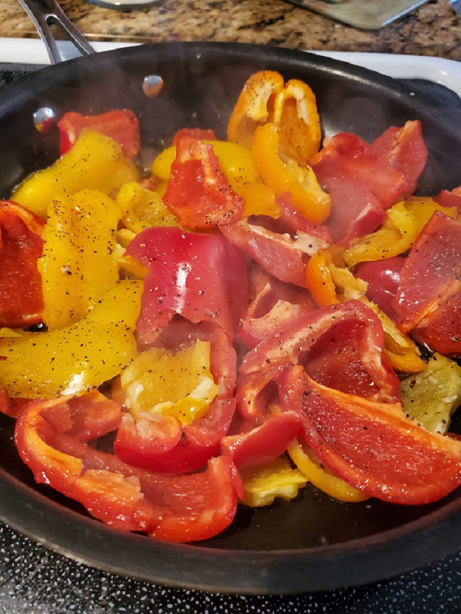 raw cut up colorful peppers