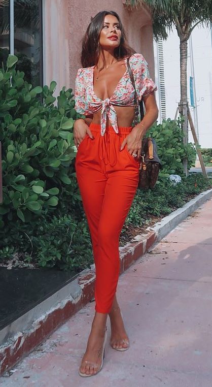 what to wear with a pair of red pants : heels + printed crop top + bag