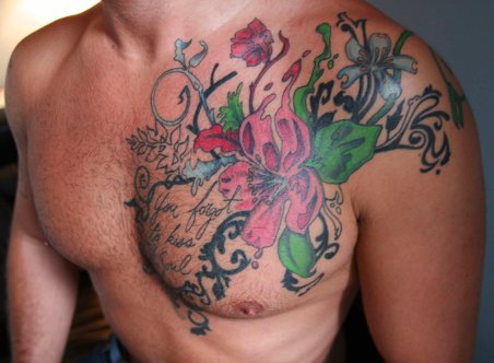 Flowers chest tattoo idea for men.
