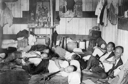 A scene from an old-time Chinatown opium den. (All Things Interesting)