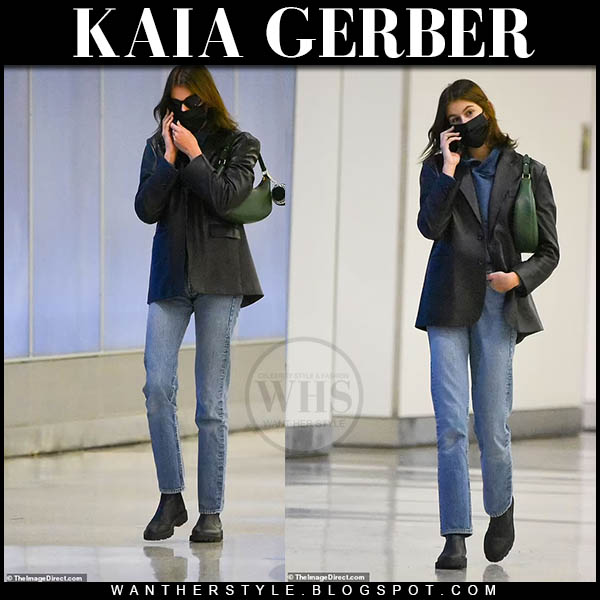 Kaia Gerber in black leather blazer, jeans and boots