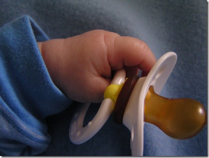 little hand with paciifer 2