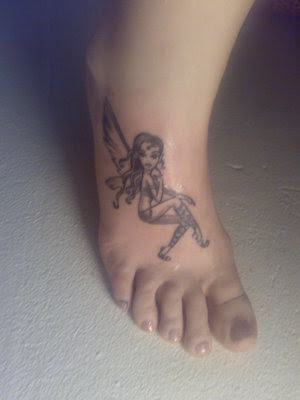 pretty foot tattoos. foot tattoos for women. fairy